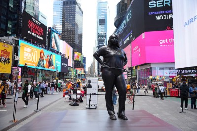 A sculpture of a Black woman in Times Square.