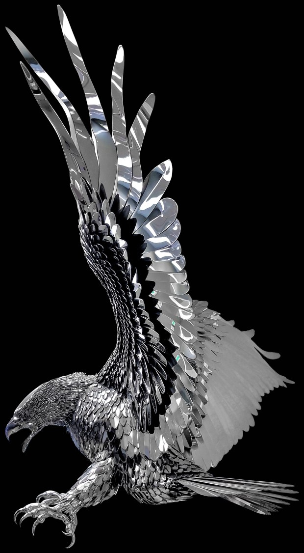This life-size polished stainless steel eagle sculpture created by metal...