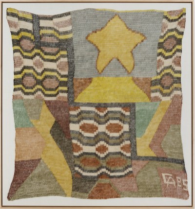 A weaving featuring a star amid striped patterning.