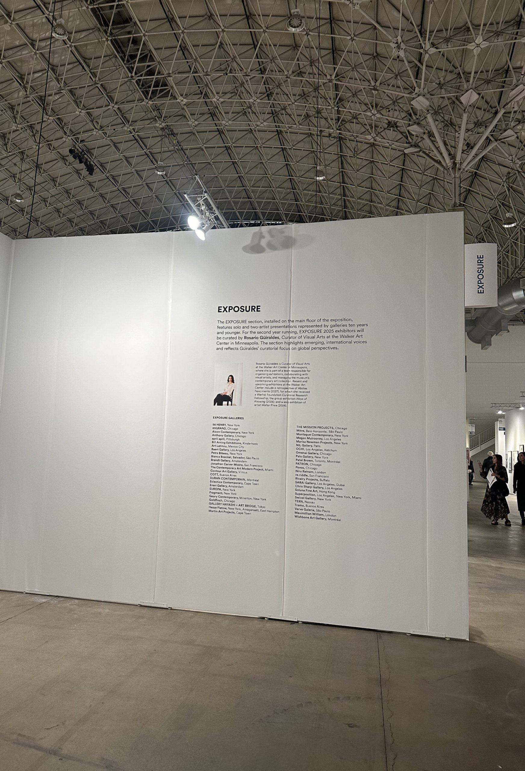 A large wall display at an art fair, titled