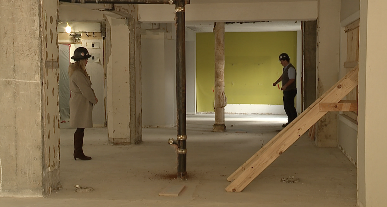 Zach Molzer explains the floor plan of an apartment at the Aladdin