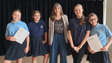 BBC Cornerstone workshop leader Laura Howells-Green with students