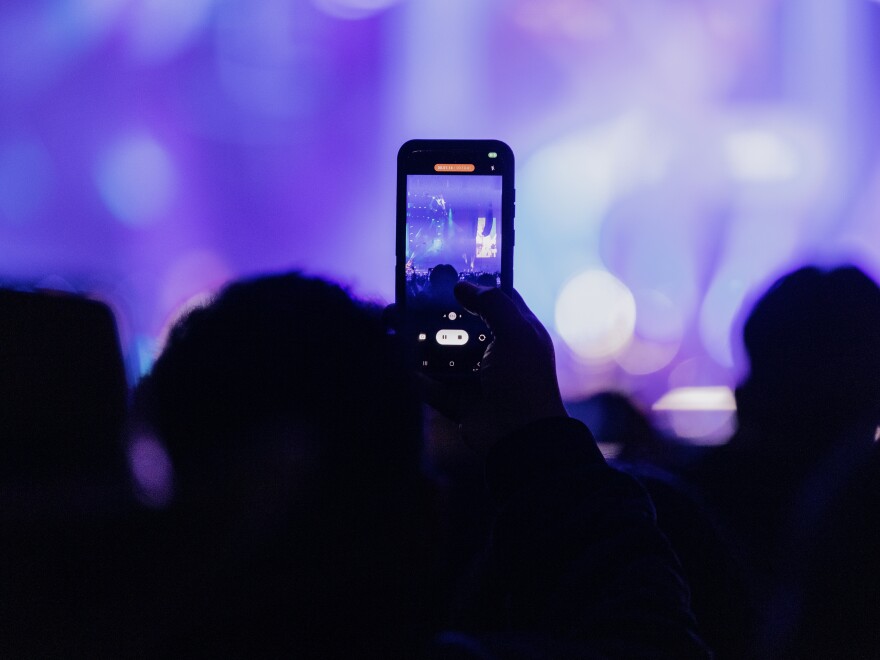 Fans eagerly await the start of the norteño band Los Tigres del Norte show at Madison Square Garden in Midtown, New York City, New York.