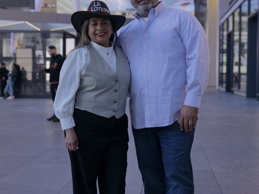Elizabeth Vargas and Luis Vargas, stand for a portrait before enjoying an evening watching the norteo band Los Tigres del Norte play Madison Square Garden.