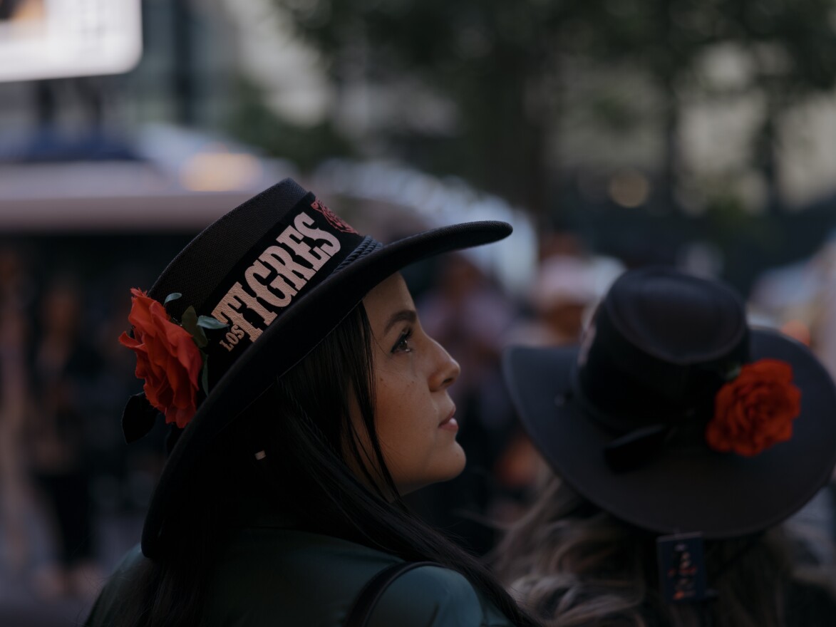 Hundreds of fans of the norteño band Los Tigres del Norte navigate the bustling block outside of Madison Square Garden before the start of the Sinaloa, Mexico band's show at Madison Square Garden.