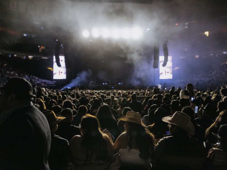 Fans eagerly await the start of the norteño band Los Tigres del Norte show at Madison Square Garden.
