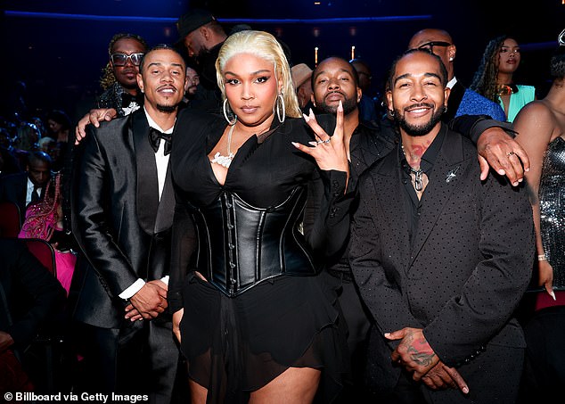 She was also seen posing with Lil' Fizzle Pop, J-Boog and Omarion, with many taking to social media to say how great she looked.