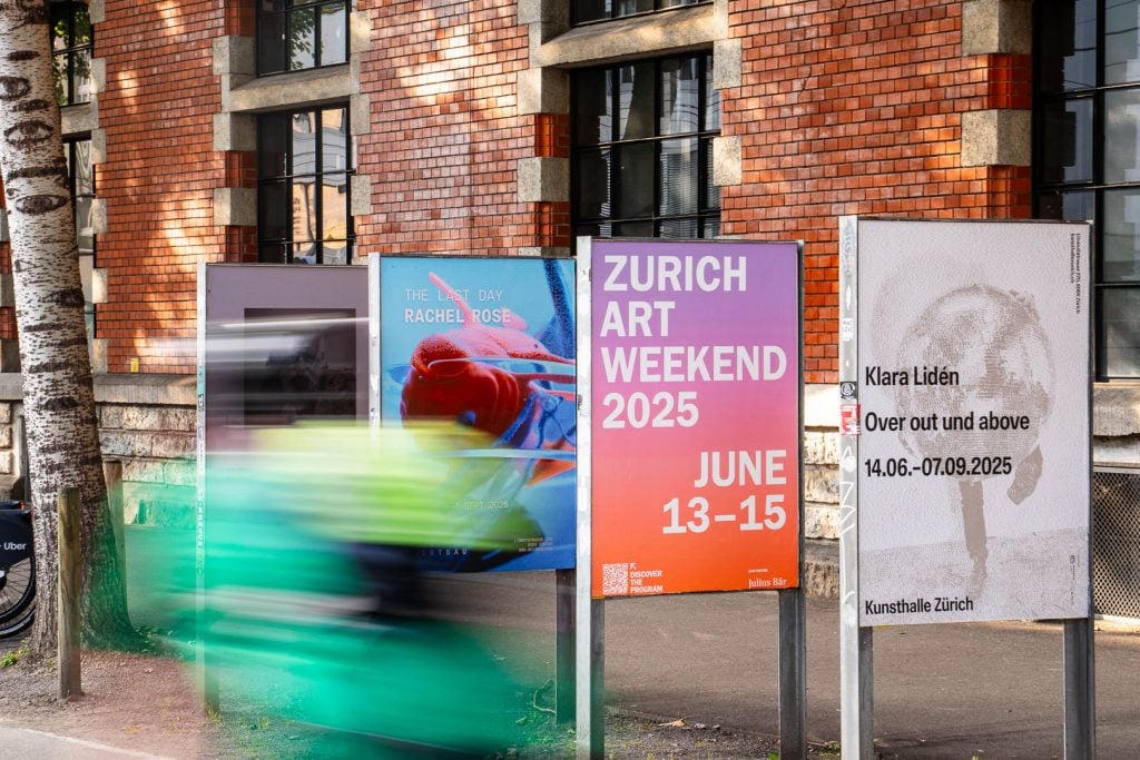 A photo showing a colorful signage of Zurich Art Weekend