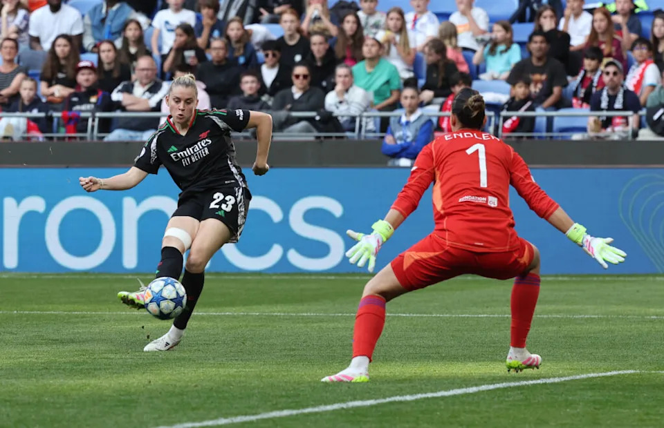 DECINES-CHARPIEU, FRANCE - APRIL 27: Alessia Russo of Arsenal scores her team's third goal past Christiane Endler of Olympique Lyonnais during the UEFA Women's Champions League semifinal second leg match between Olympique Lyonnais and Arsenal WFC at OL Stadium on April 27, 2025 in Decines-Charpieu, France. (Photo by Catherine Steenkeste/Getty Images)